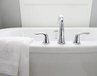 A clean white refinished bathtub from Bathtub Refinishing Akron